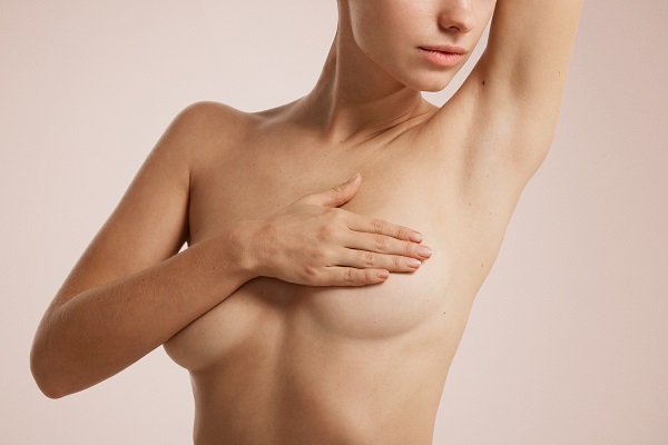 Help! My Breast Implants Are Different Sizes - Restora Austin